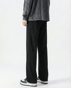 Black cotton straight leg sweatpants back view on tall model