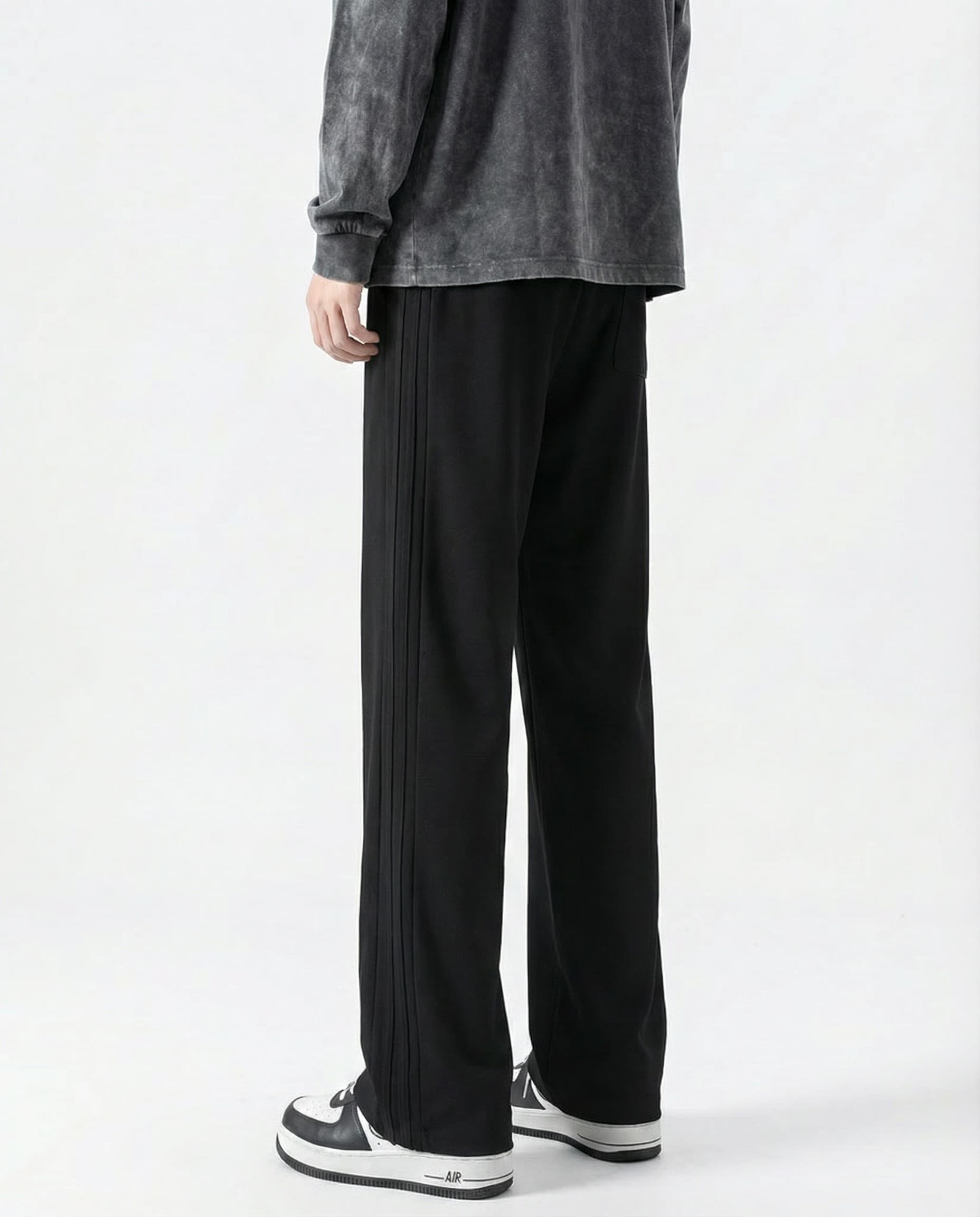Black cotton straight leg sweatpants back view on tall model