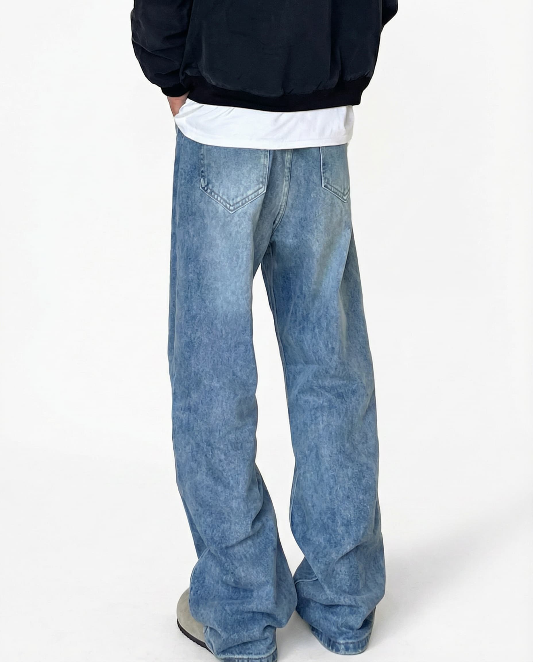 Relaxed fit jeans side view showing wide leg silhouette