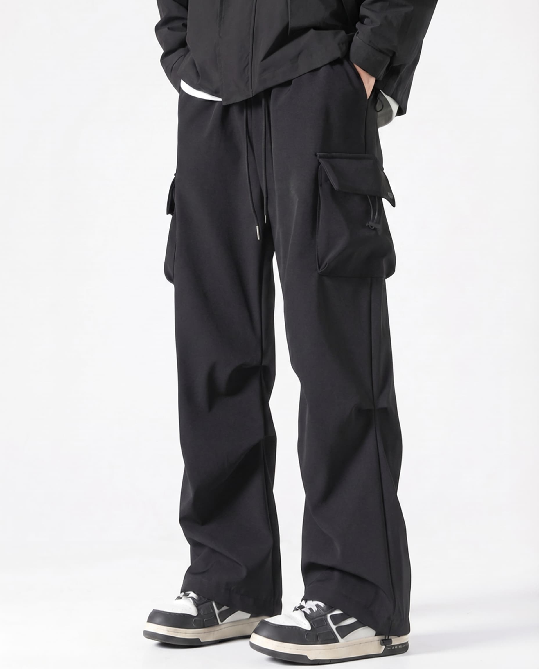 Black straight fit vintage cargo pants side view on tall model
