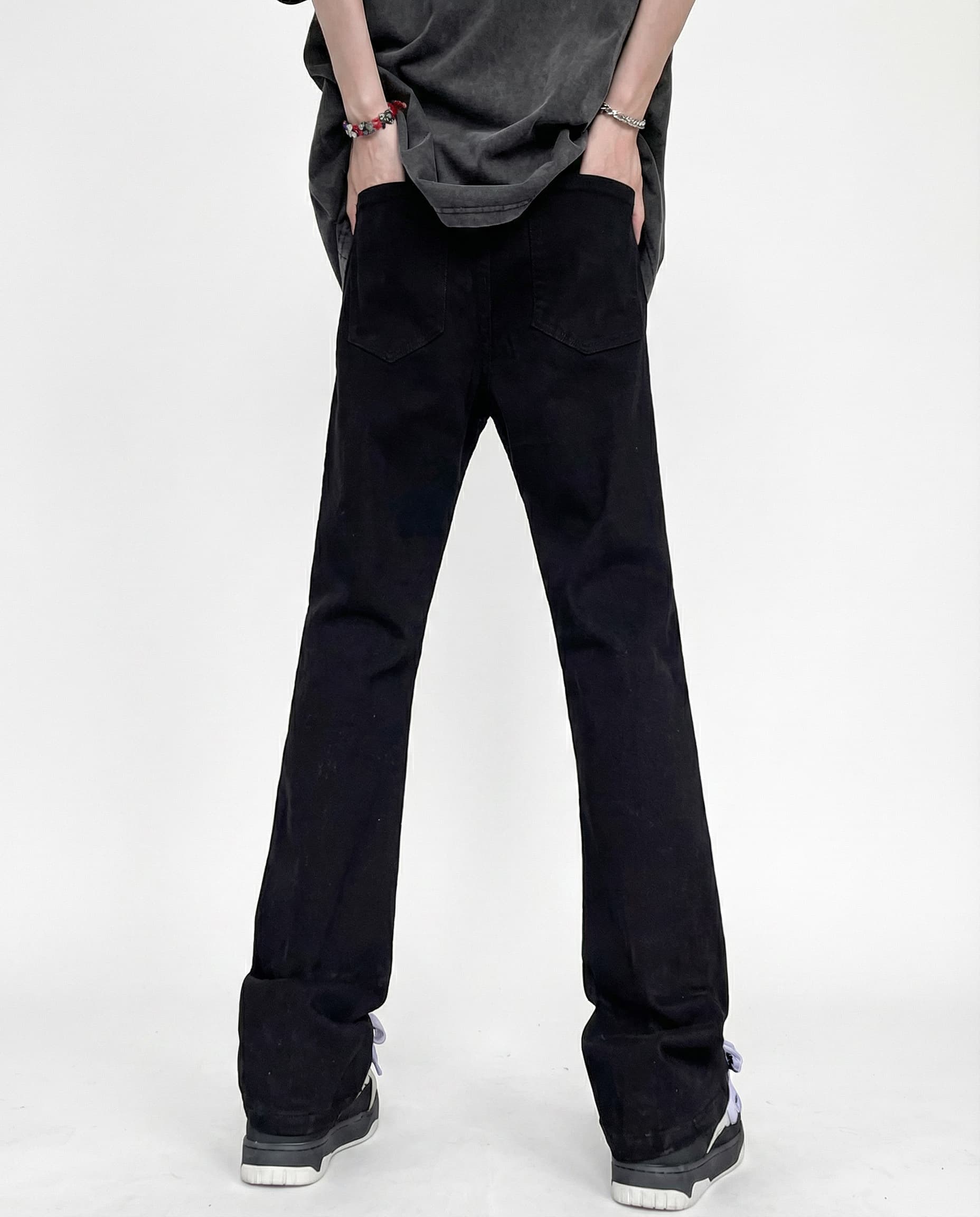 Black classic straight-leg jeans for tall men, back view with clean minimal styling