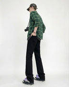 Black classic straight-leg jeans for tall men styled with jacket, editorial outfit inspiration