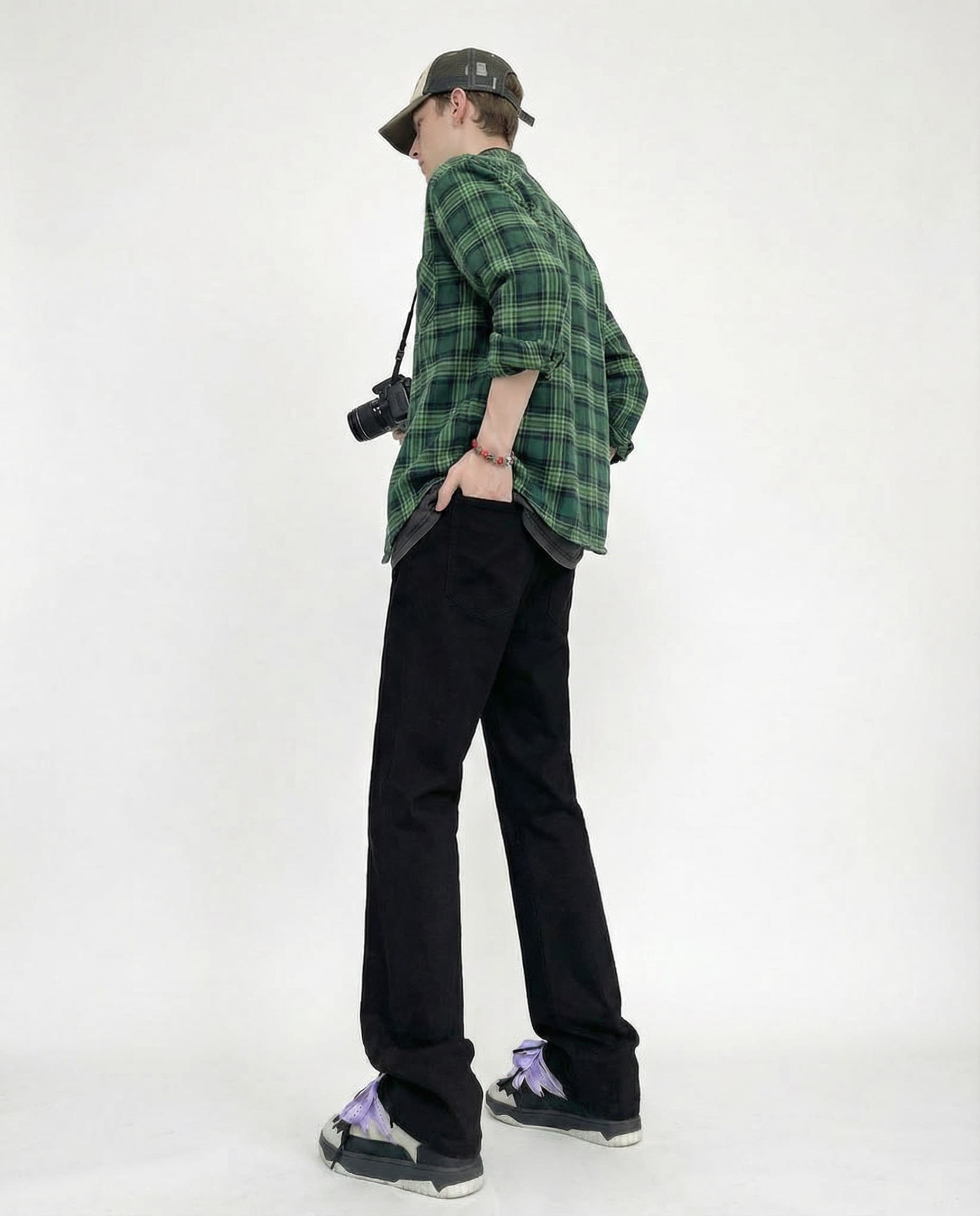 Black classic straight-leg jeans for tall men styled with jacket, editorial outfit inspiration