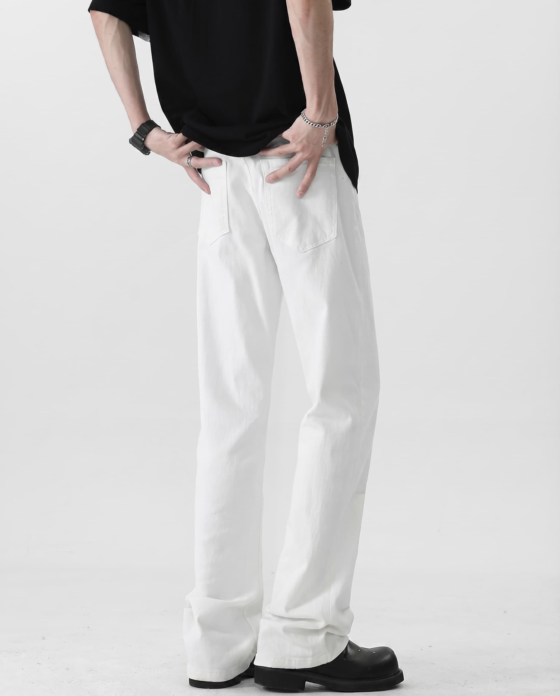 Men's white classic straight-leg jeans for tall men, back view highlighting clean silhouette and length