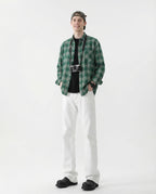 White straight-leg jeans for tall men styled with green jacket, full casual outfit look