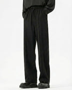 Tall men's black crinkle trousers, straight-leg cut with clean minimal styling