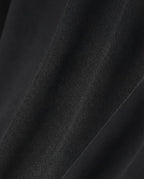 Black crinkle straight-leg pants for tall men, styled outfit with minimalist aesthetic
