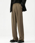 Men's crinkle wide straight pants in brown, relaxed fit styled with blazer