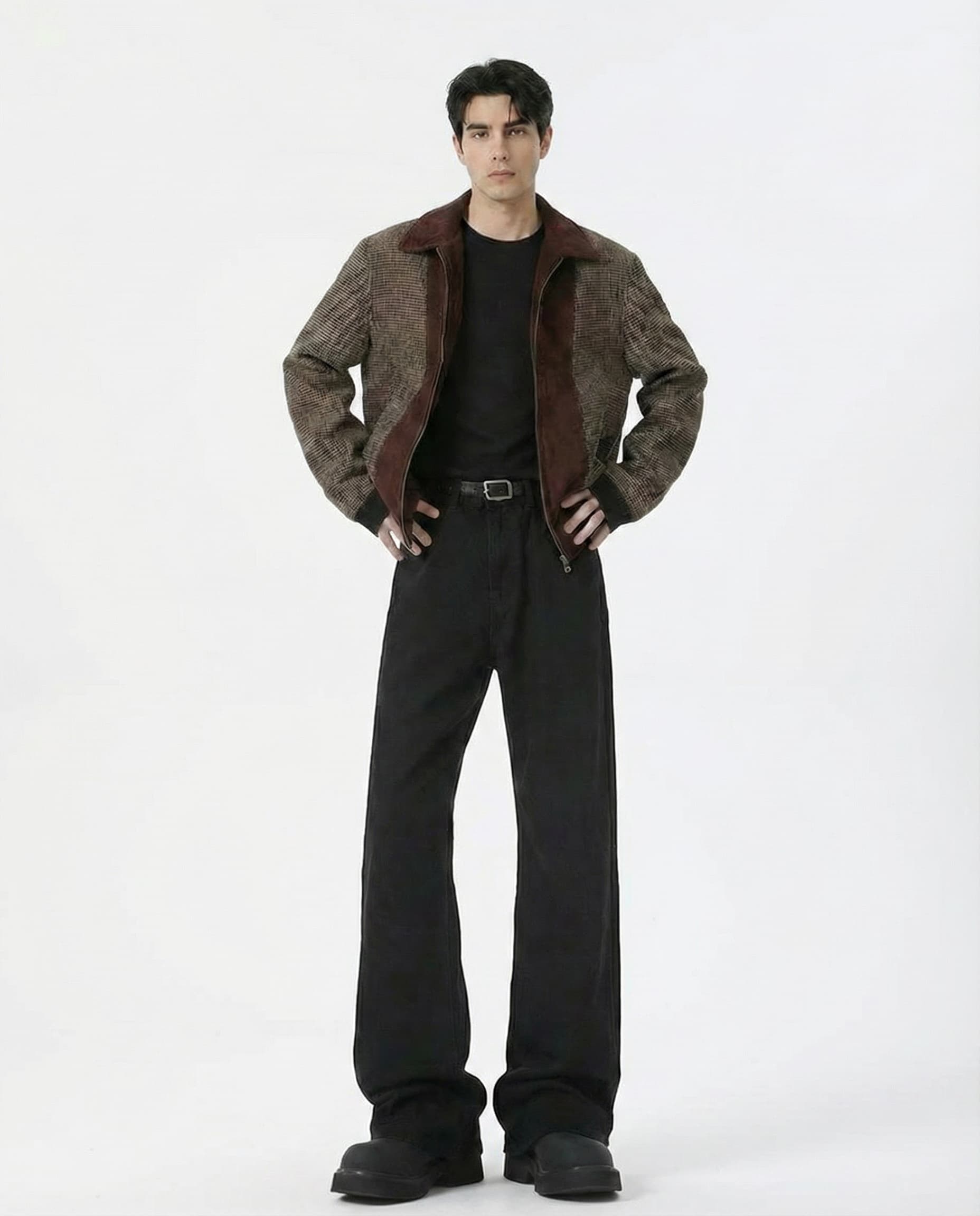 Tall men's black flare jeans, showing mid rise waist and flared leg opening