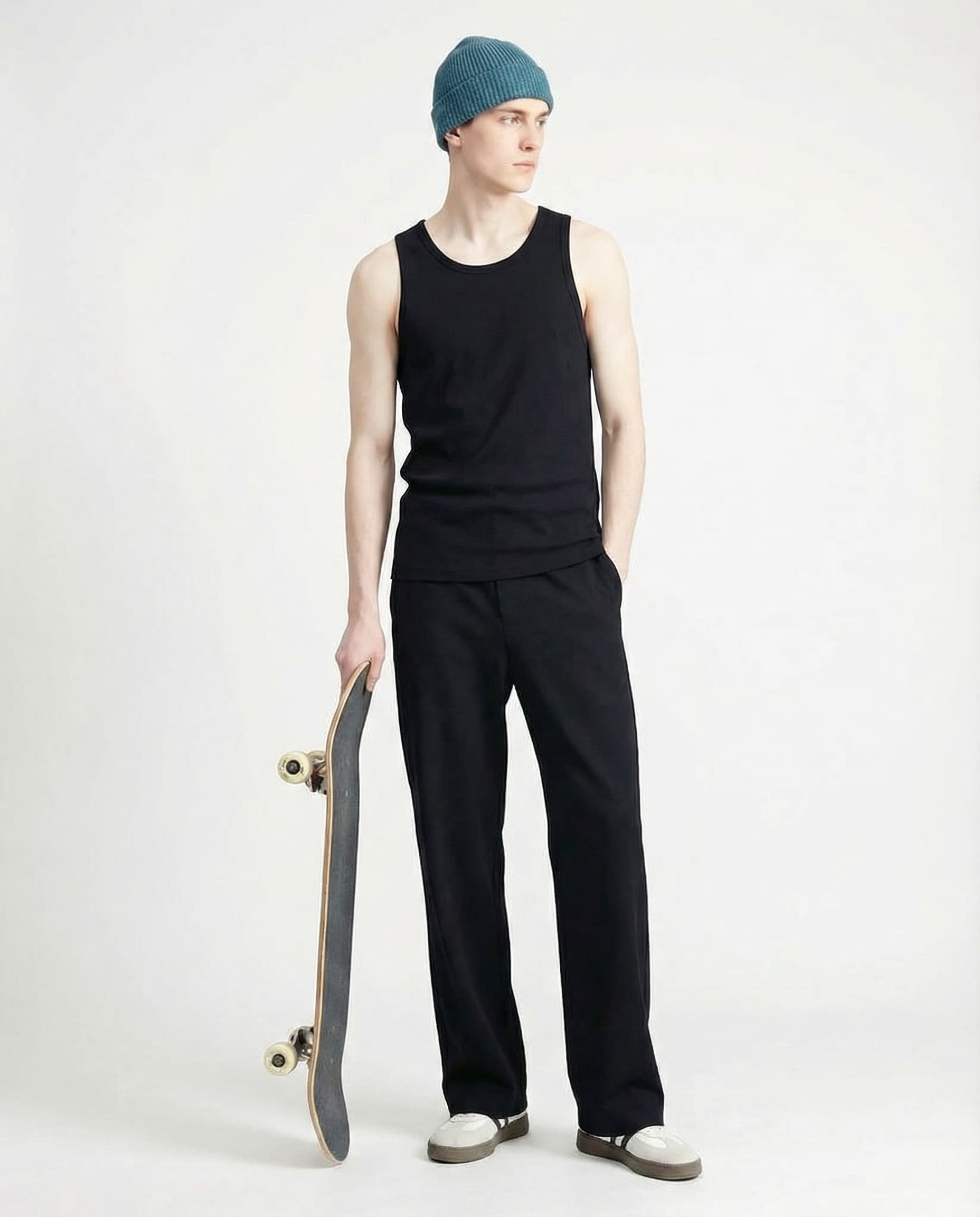 Black pull-on sweatpants for tall men styled with skateboard, urban streetwear outfit inspiration
