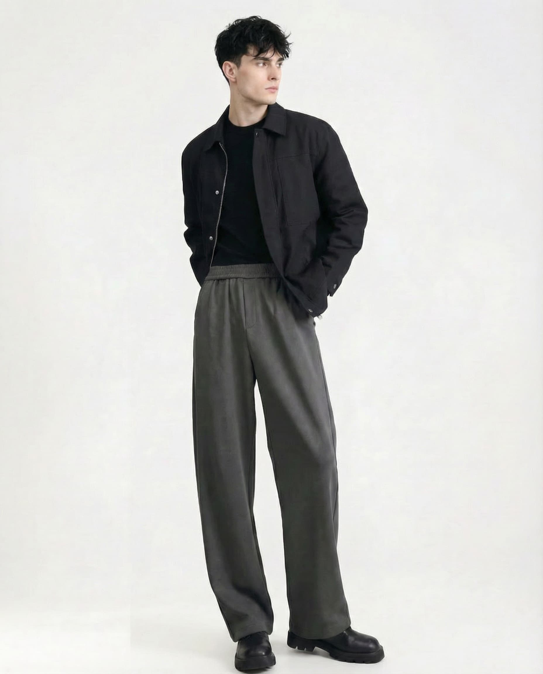 Dark gray pull-on sweatpants for tall men styled with black top, monochrome smart casual outfit