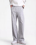 Grey pull-on straight leg sweatpants for tall men, full-length side view with casual white sneaker styling